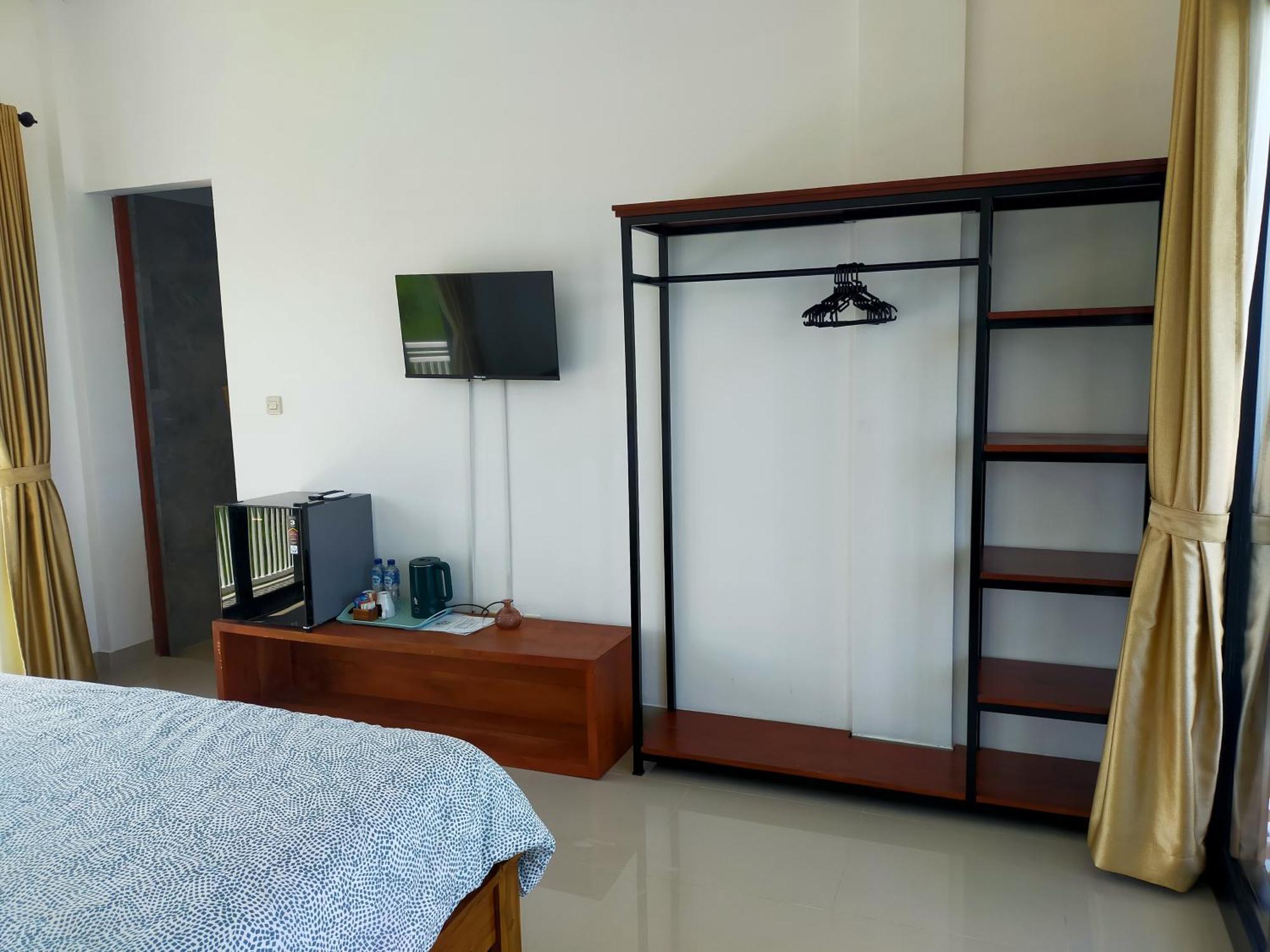 Limun Guesthouse Amlapura Quarto foto
